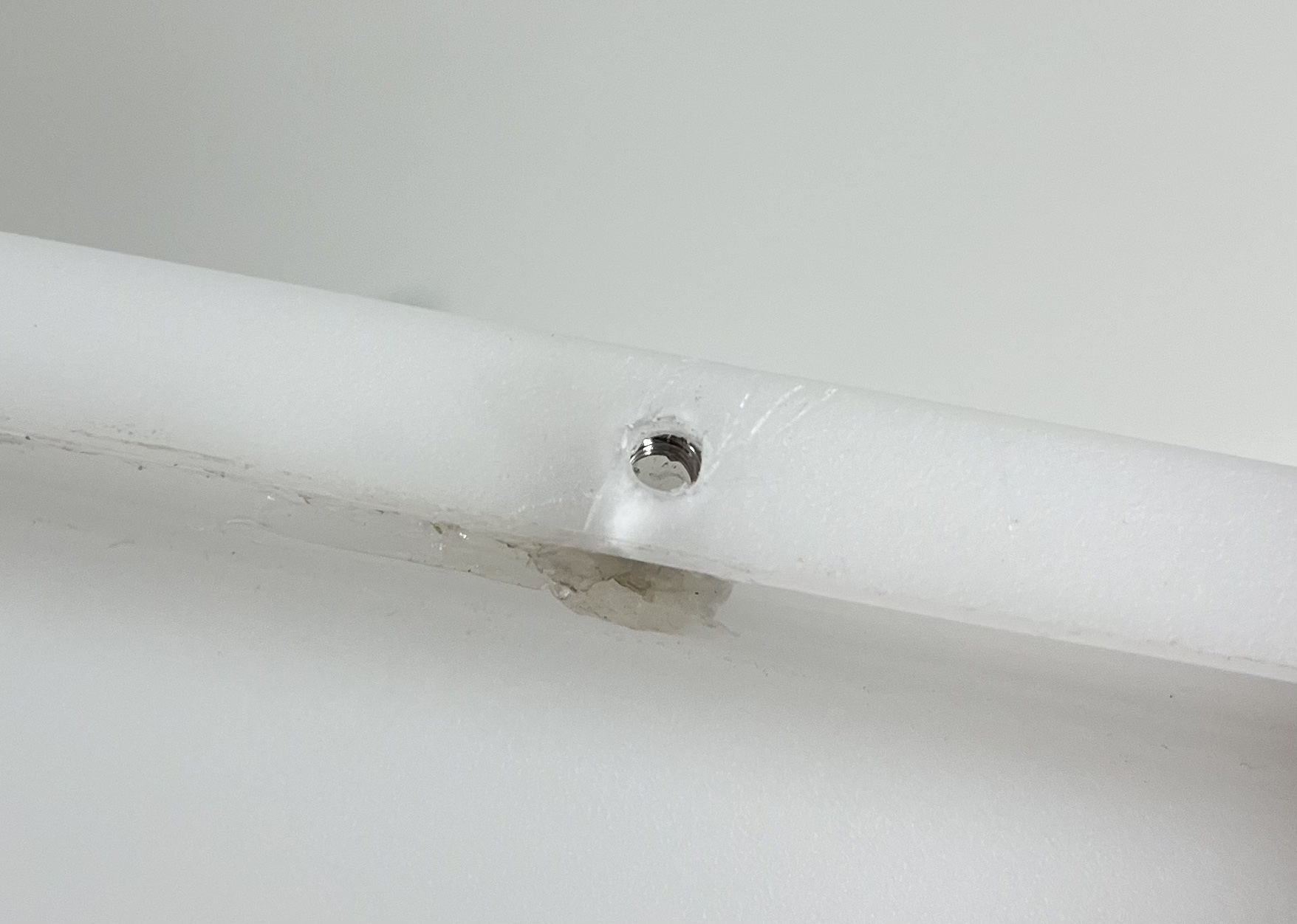 After glue is cold, remove the screw, and the nut would remain in place